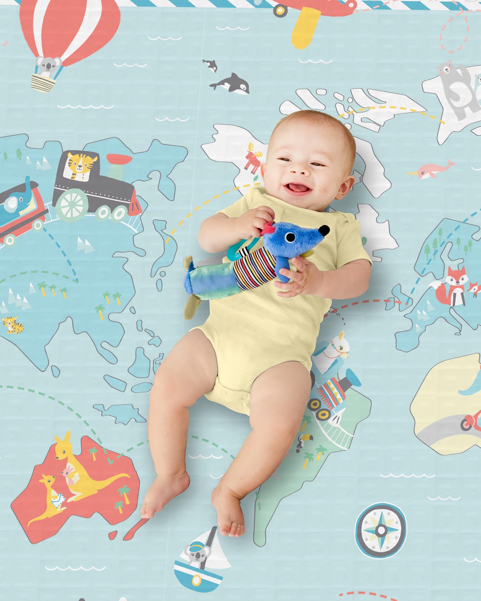 Baby on the Skip Hop Doubleplay Reversible Playmat Little Travellers