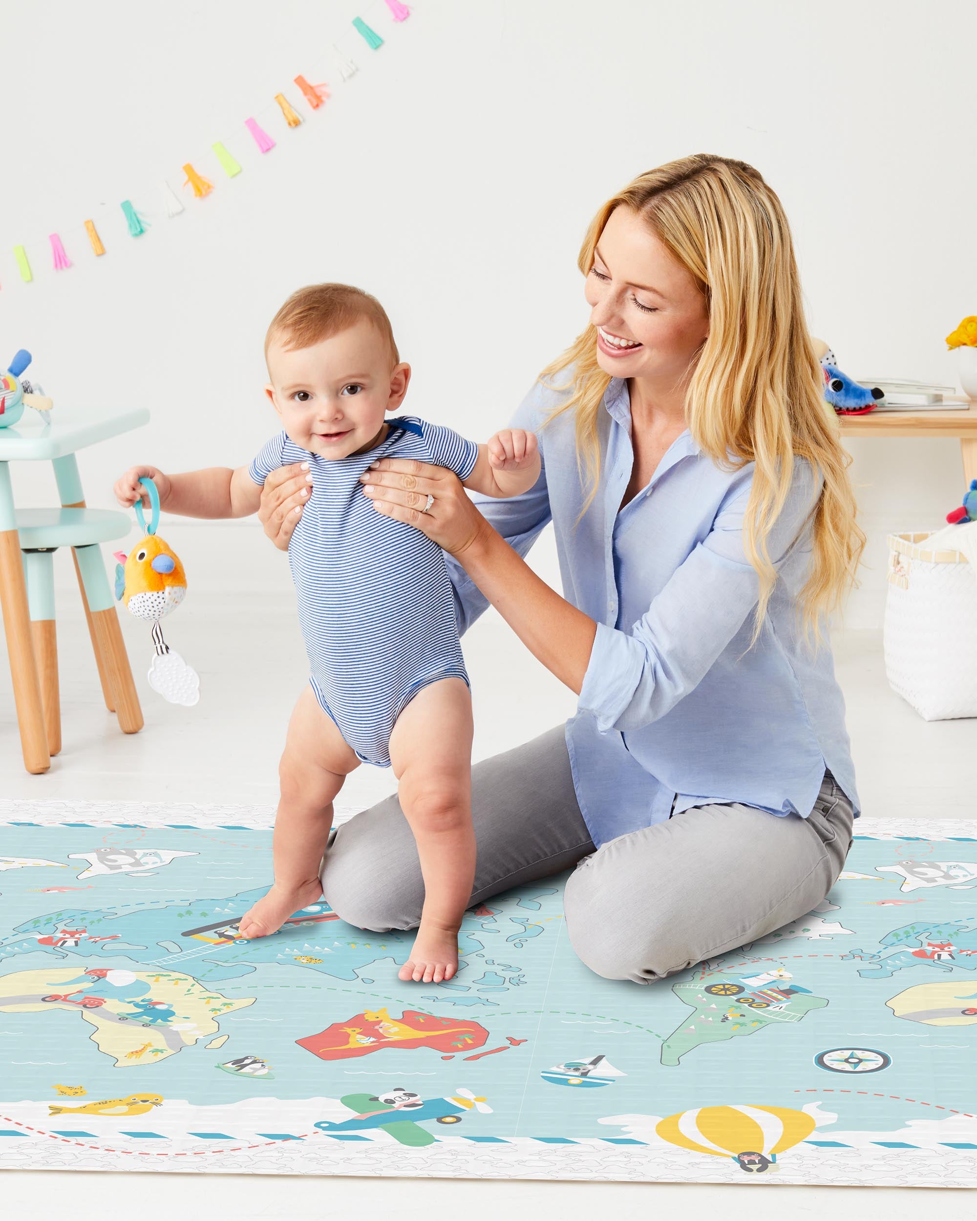 Mummy and baby playing on the Skip Hop Doubleplay Reversible Playmat Little Travellers